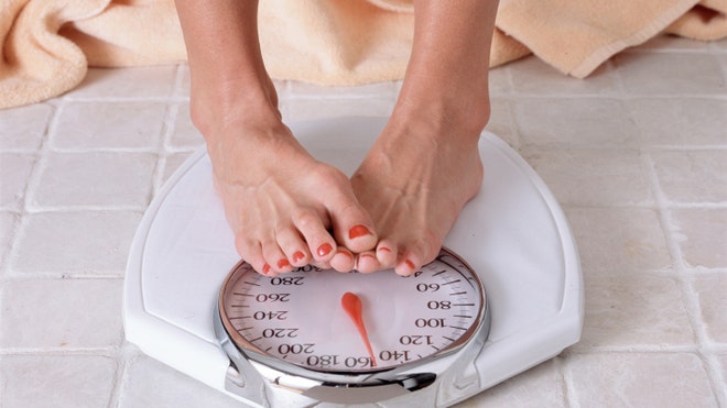 Feet on scale istock.jpg